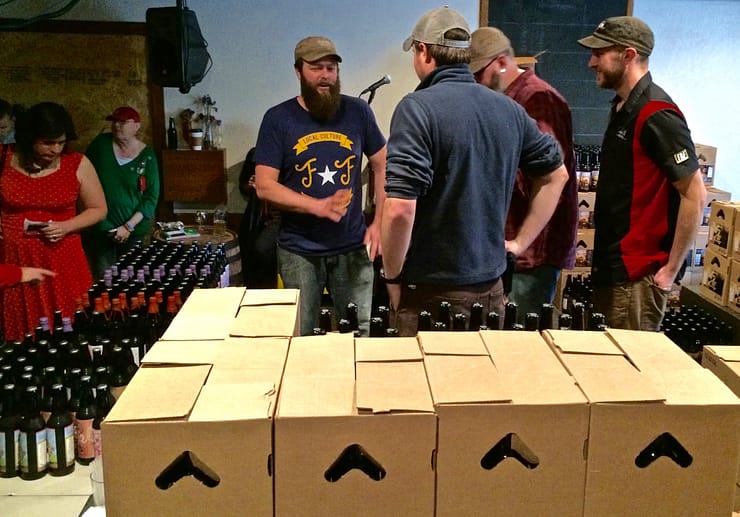 Jackie O's staff prepare for the annual Anniversary Bottle Sale